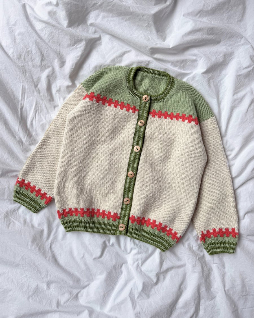 Cross Cardigan Junior liggende