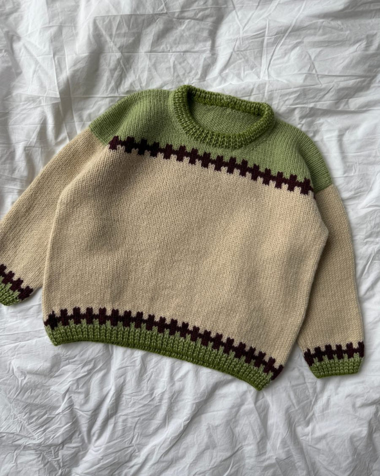 Barn iført Cross Sweater Junior