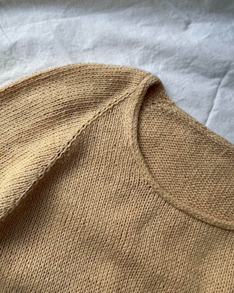 Closeup af ferskenfarvet Kumulus Tee O-neck