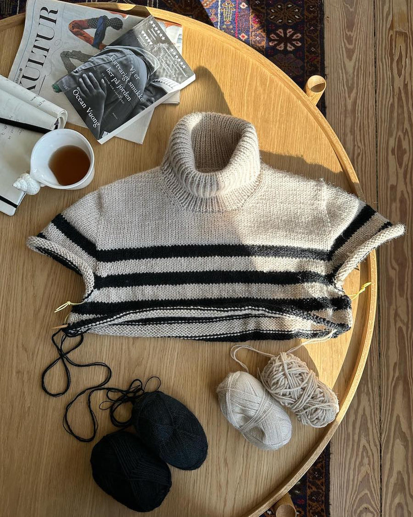 Maskewires sat på ærmer af Lyon Sweater Chunky