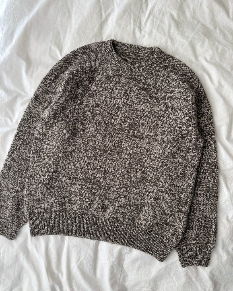 Brun og hvid Melange Sweater Man liggende