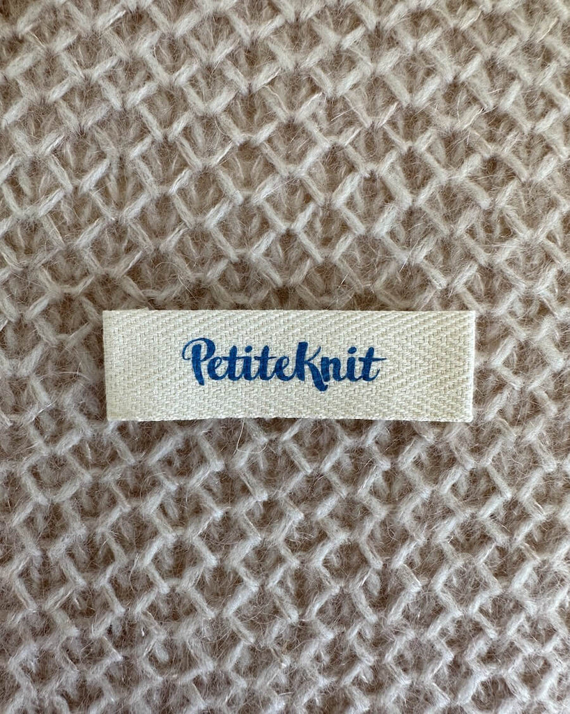 Ét electric blue petiteknit label 