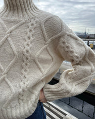 Detaljer på hvid Saga Sweater