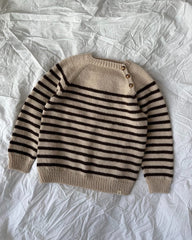 Liggebillede af sort og hvid Seaside Sweater