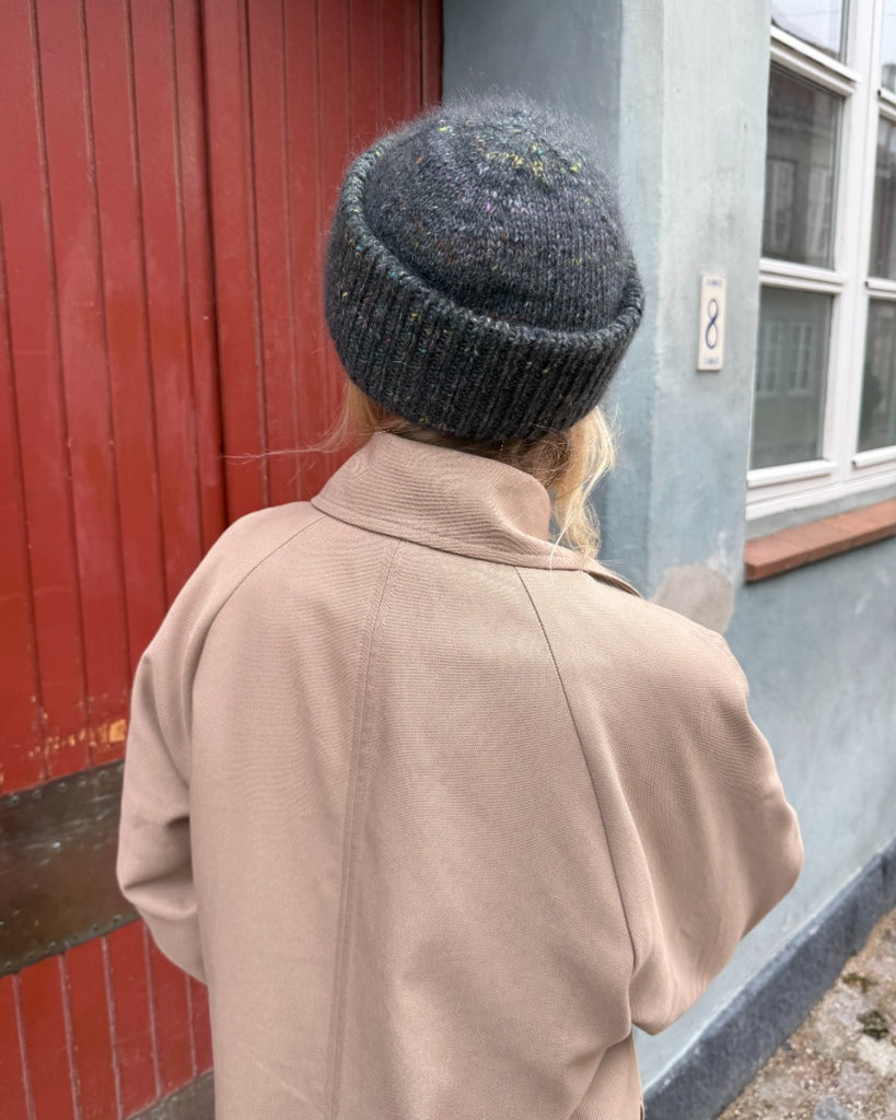 Kvinde iført grøn Terrazzo Hue