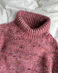 Detaljebillede af pink Terrazzo Sweater Junior på dyne