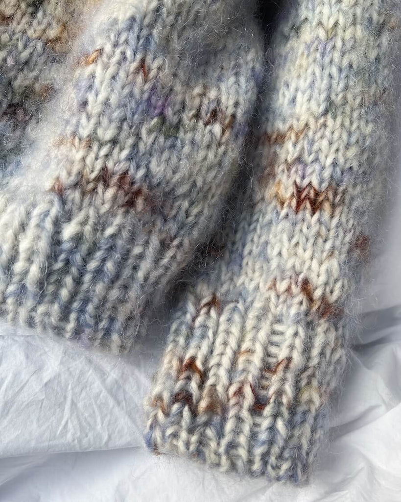 Detaljebillede af blå Marble Sweater Junior
