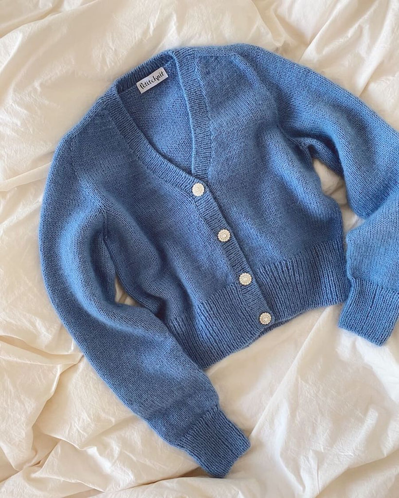 April cardigan med blingknapper