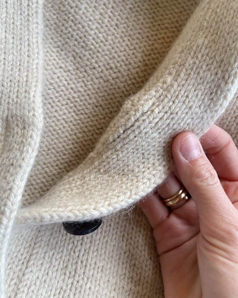 Closeup af hvid Champagne Cardigan