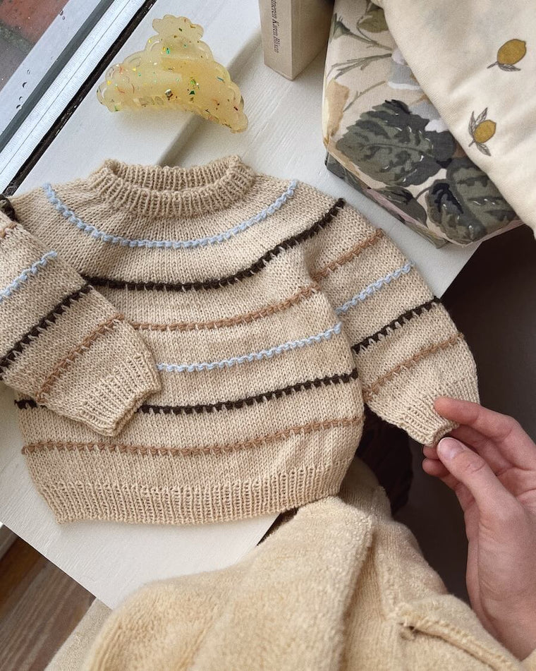 Closeup af Festival Sweater Baby