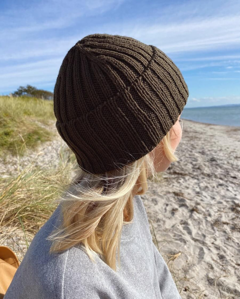 Kvinde iført mørkegrøn Hipster Hue