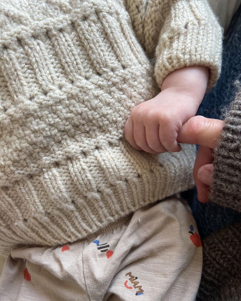 Closeup af lys Ingrid Sweater Baby 
