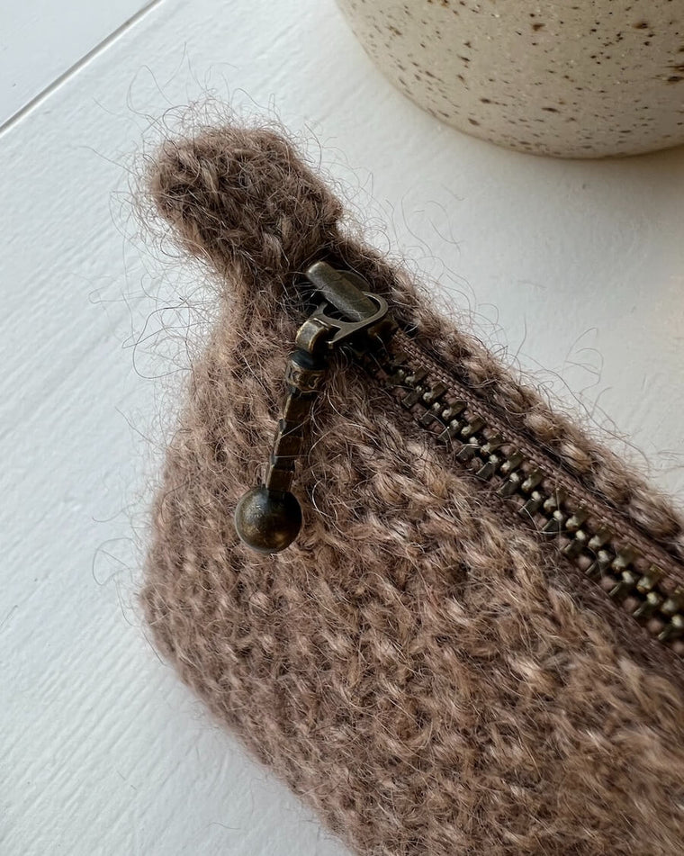 cleo purse liggende