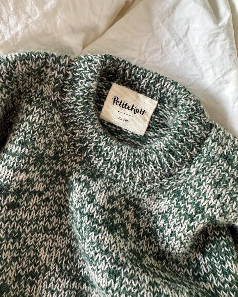 Closeup af grøn Melange Sweater Junior 