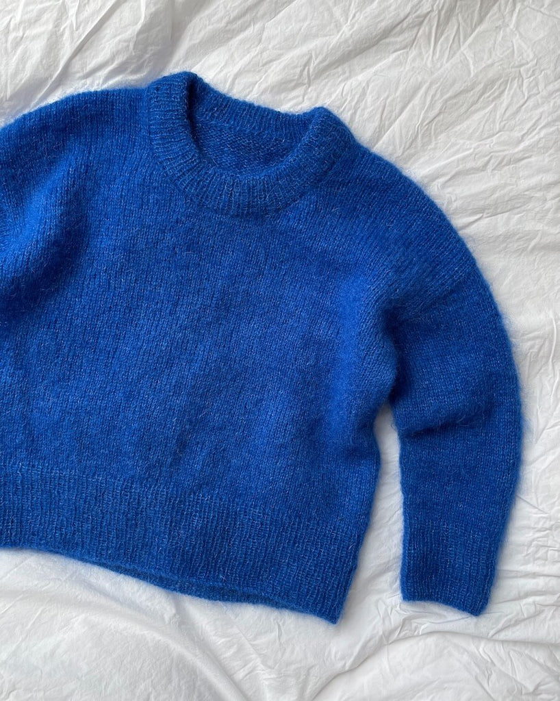 Liggebillede af blå Stockholm Sweater Junior